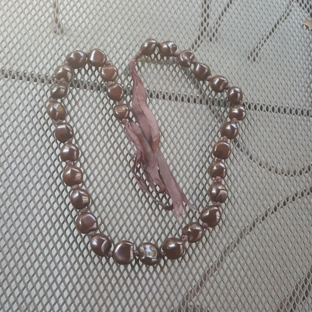 Hawaiian Kukui nut necklace.